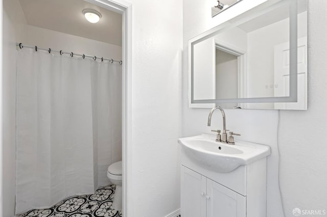 11 Sparta St, San Francisco, CA 94134 - full bathroom with vanity, toilet, a shower with curtain, and tile patterned flooring