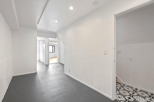 11 Sparta St, San Francisco, CA 94134 - hallway featuring recessed lighting, baseboards, and concrete flooring