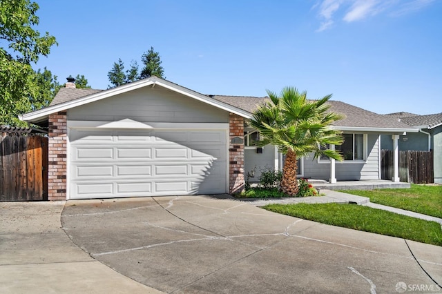 ranch-style house featuring a garage