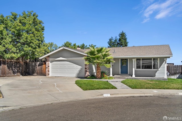 ranch-style house featuring a garage