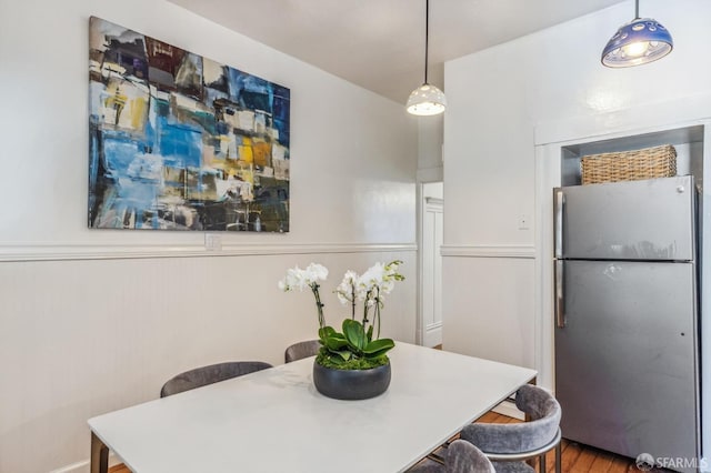 dining area featuring hardwood / wood-style flooring