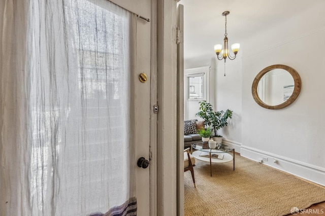 interior space featuring an inviting chandelier