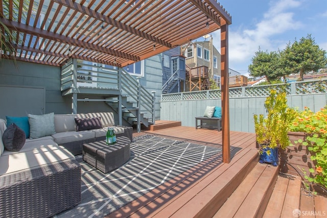 wooden terrace with outdoor lounge area, fence, a pergola, and stairs