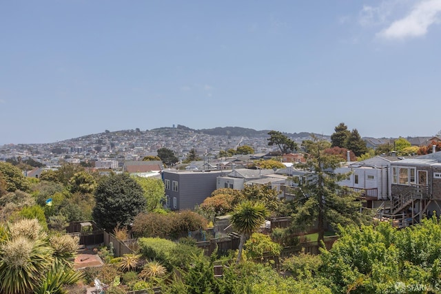 view of mountain backdrop with nearby suburban area