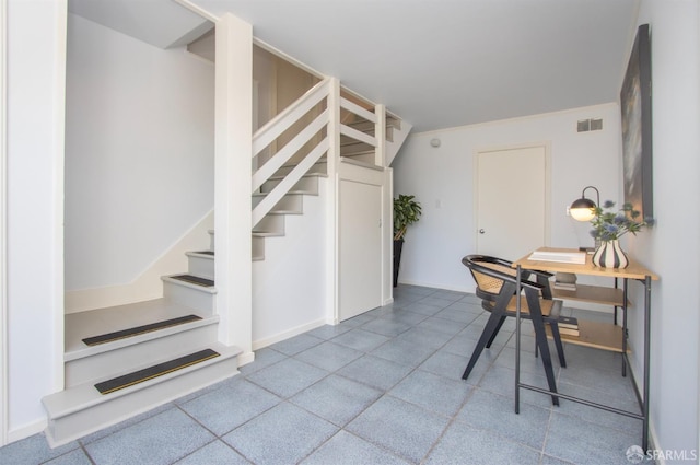 office with baseboards and visible vents