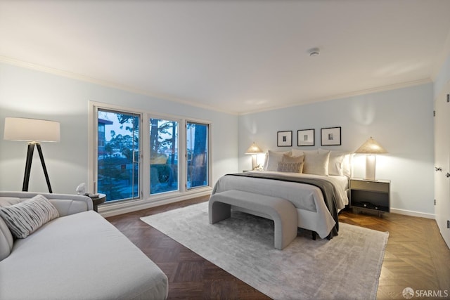 bedroom with baseboards and ornamental molding