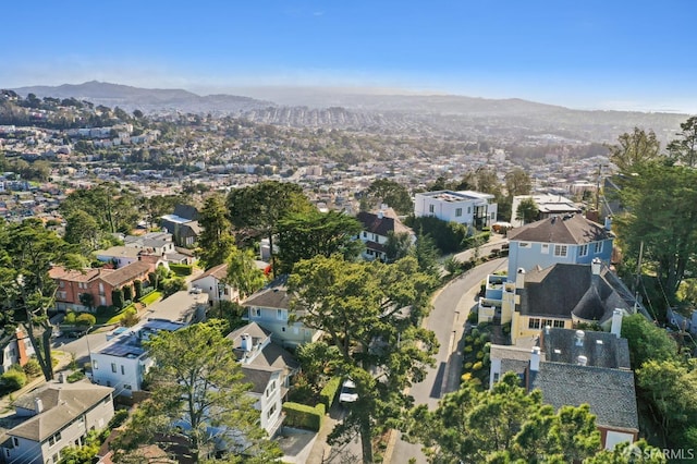 drone / aerial view with a residential view and a mountain view