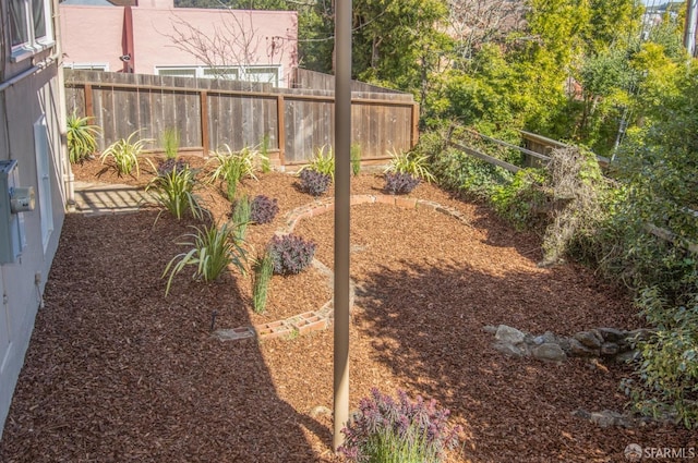 view of yard with fence