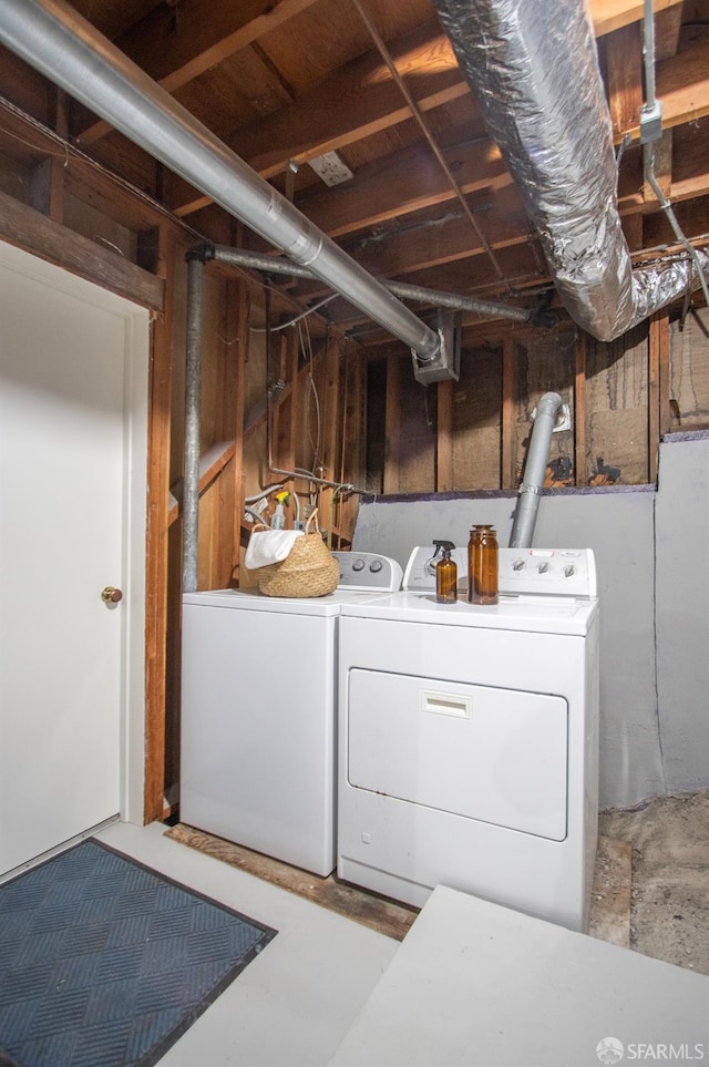 laundry area featuring laundry area and washer and clothes dryer