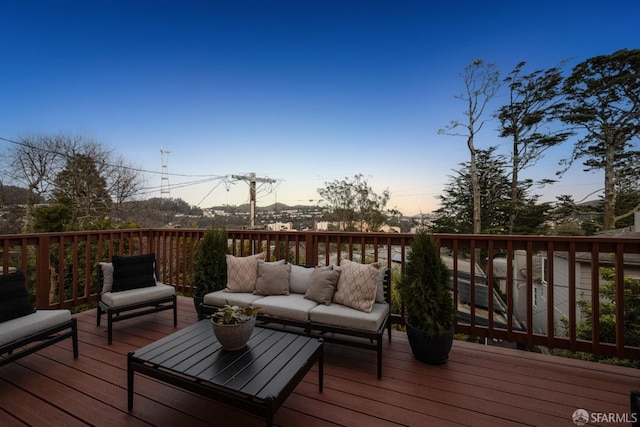 wooden deck featuring an outdoor hangout area