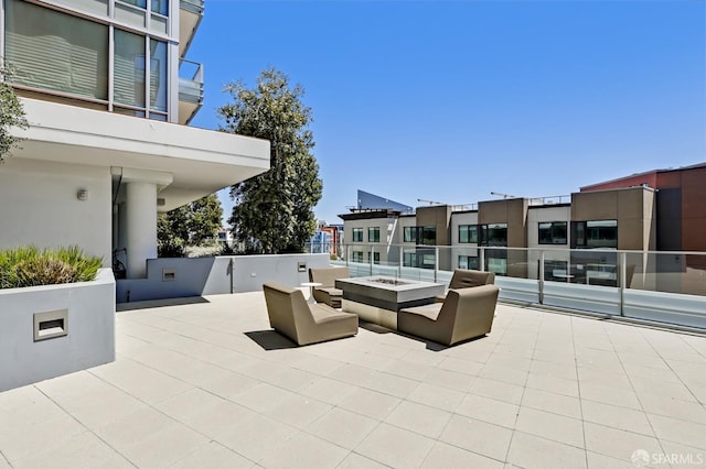 view of patio / terrace featuring a fire pit