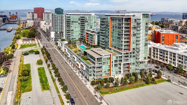 birds eye view of property featuring a water view