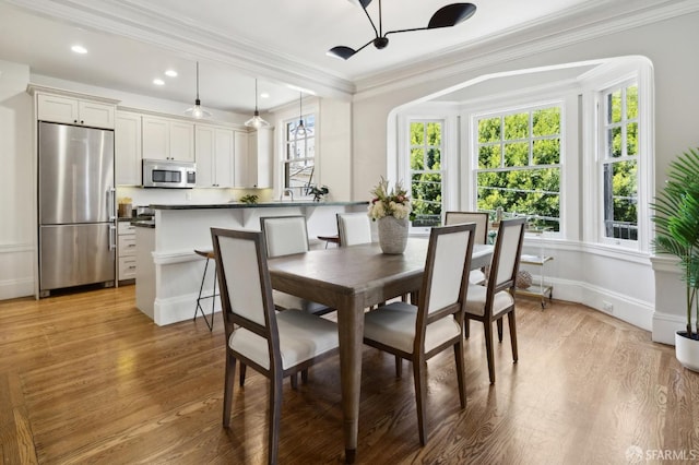 1856 Franklin St Unit 4, San Francisco, CA 94109 - dining space with healthy amount of natural light, ornamental molding, light wood-style floors, baseboards, and recessed lighting