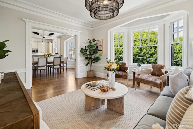 1856 Franklin St Unit 4, San Francisco, CA 94109 - living room with crown molding, wood finished floors, and a chandelier