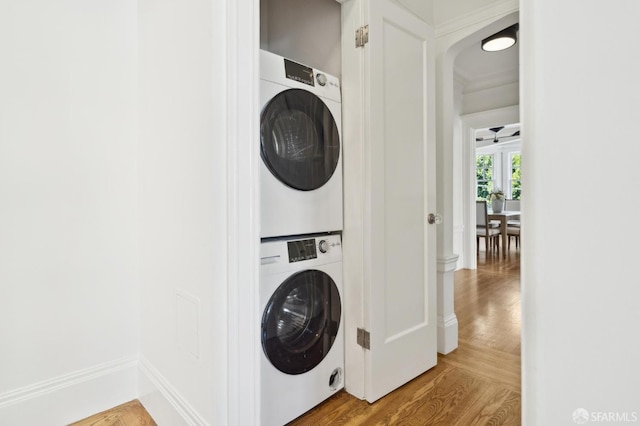 1856 Franklin St Unit 4, San Francisco, CA 94109 - laundry area with estacked washer and dryer and wood finished floors