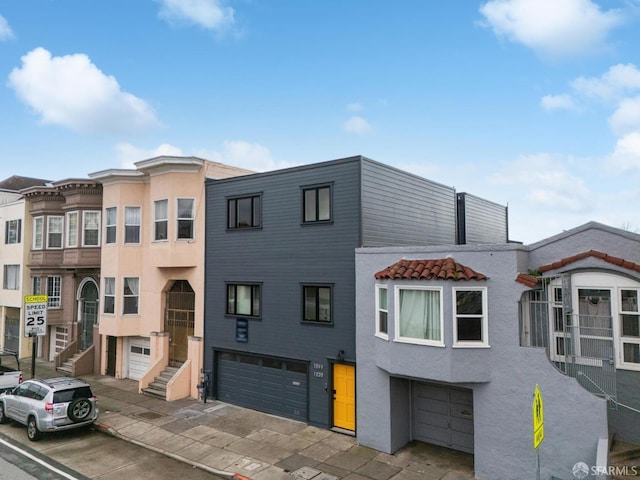 townhome / multi-family property featuring stucco siding