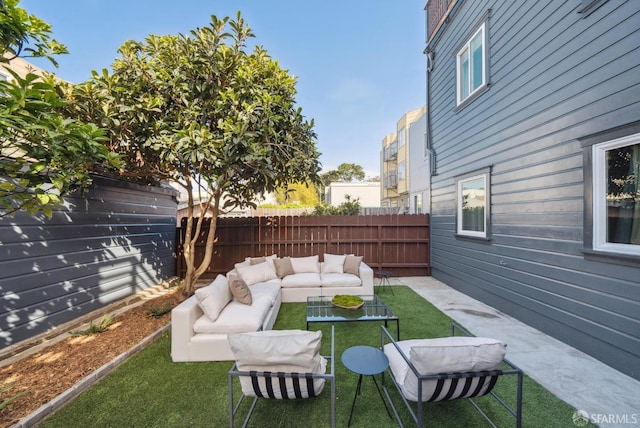 view of yard with an outdoor hangout area and a fenced backyard