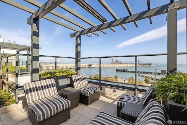 view of patio / terrace featuring a water view, a balcony, an outdoor hangout area, and a pergola