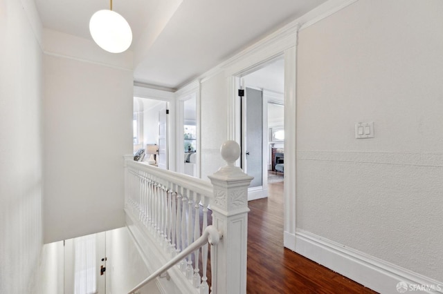 corridor featuring dark hardwood / wood-style flooring