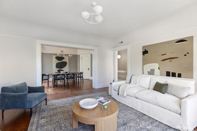 living room with dark hardwood / wood-style floors