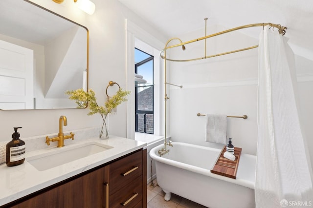 bathroom with shower / bath combination with curtain, tile patterned floors, and vanity