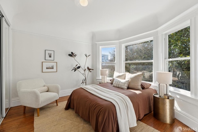 bedroom with light wood-type flooring