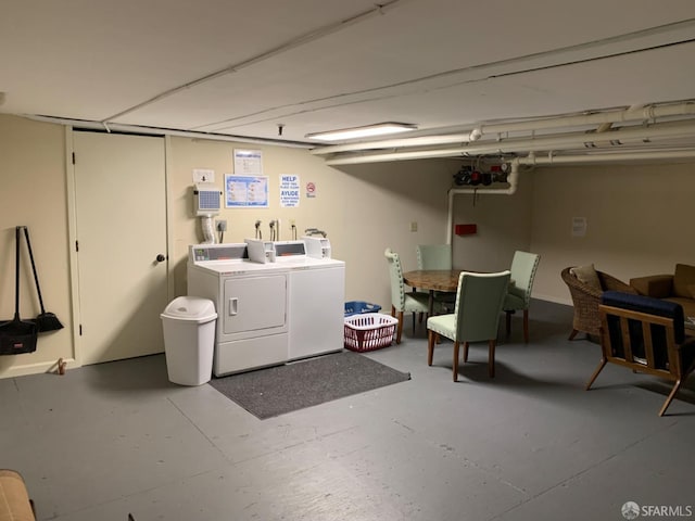 community laundry room featuring independent washer and dryer