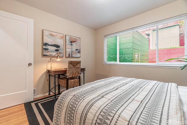 bedroom featuring hardwood / wood-style floors