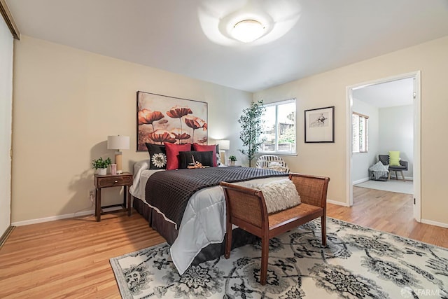 bedroom with light hardwood / wood-style flooring