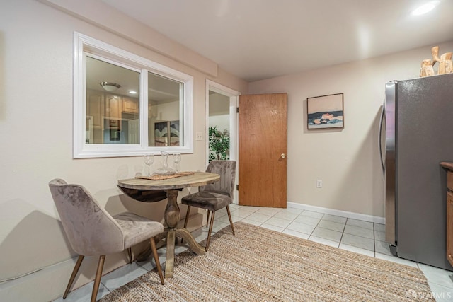 view of tiled dining space