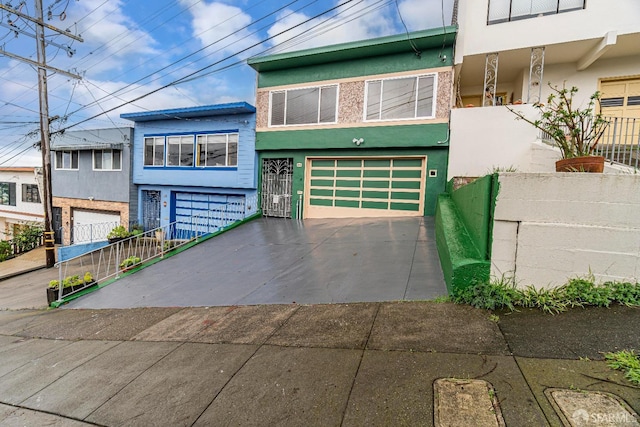 view of front of home with a garage