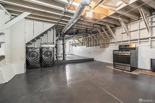 basement with washing machine and clothes dryer