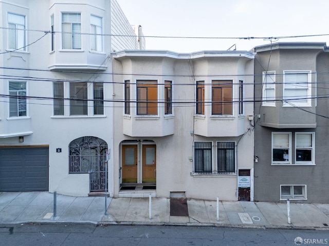 view of property with a garage