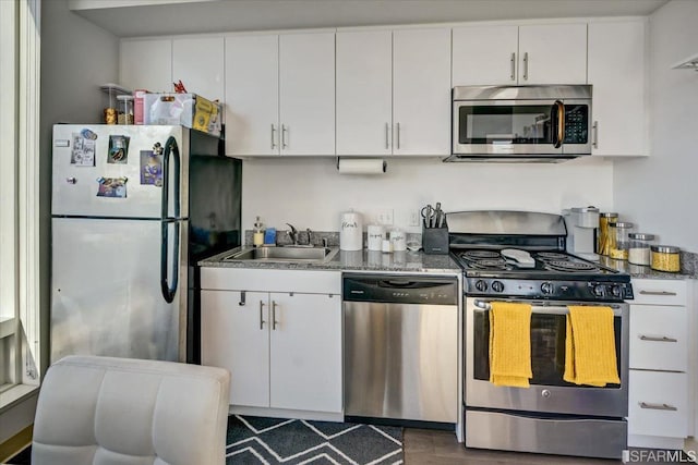 1400 Mission St, San Francisco, CA 94103 - kitchen featuring appliances with stainless steel finishes and white cabinetry