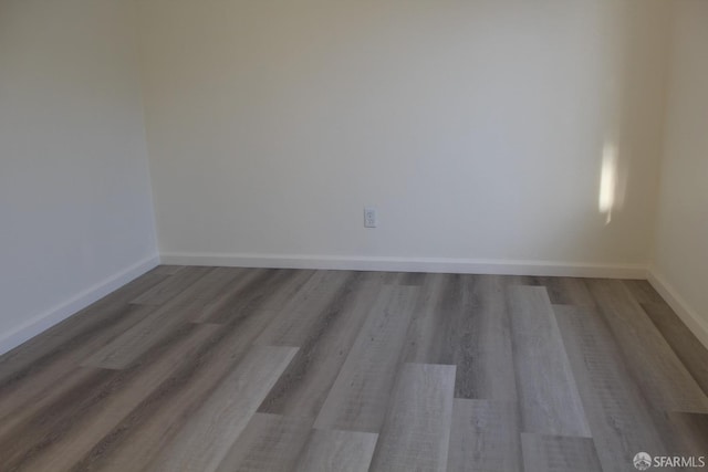 spare room featuring light wood-type flooring