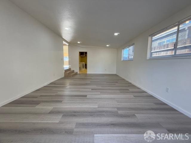 spare room featuring light hardwood / wood-style flooring