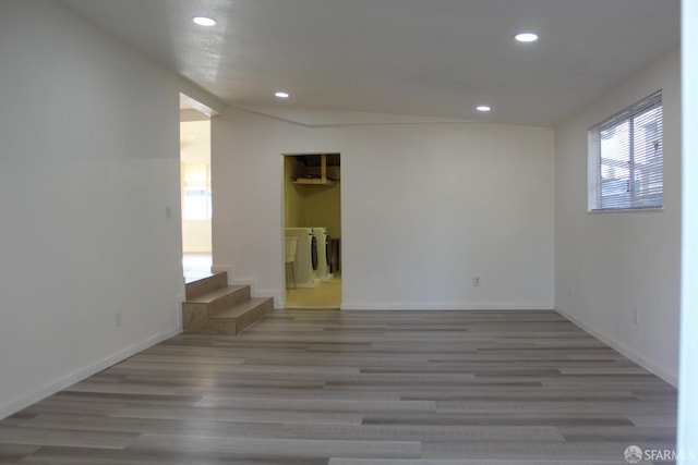 empty room with hardwood / wood-style flooring