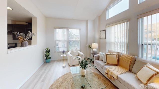 103 Stoneridge Ln Unit 2210, San Francisco, CA 94134 - living area featuring plenty of natural light and wood finished floors