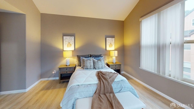 103 Stoneridge Ln Unit 2210, San Francisco, CA 94134 - bedroom featuring light wood-style floors and lofted ceiling