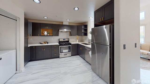 103 Stoneridge Ln Unit 2210, San Francisco, CA 94134 - kitchen featuring stainless steel appliances, open shelves, under cabinet range hood, light marble finish flooring, and decorative backsplash