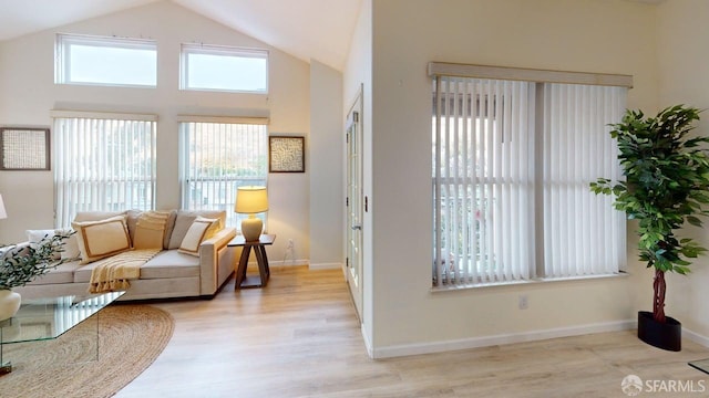 103 Stoneridge Ln Unit 2210, San Francisco, CA 94134 - living room with light wood-style flooring and vaulted ceiling