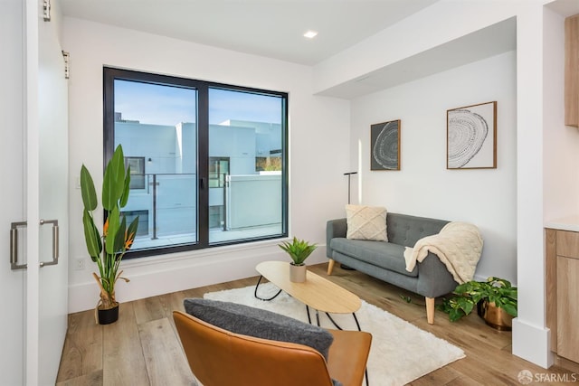 sitting room with wood finished floors