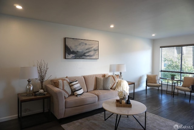 living room with dark wood finished floors, recessed lighting, and baseboards