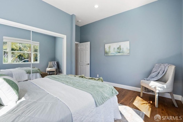 bedroom featuring recessed lighting, baseboards, dark wood finished floors, and high vaulted ceiling