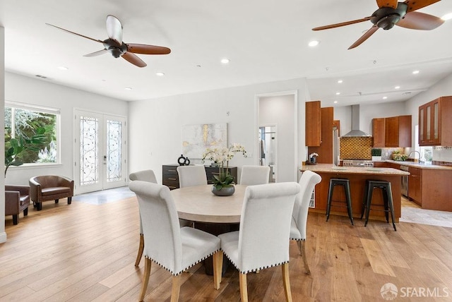 dining room featuring recessed lighting, a ceiling fan, light wood-type flooring, and visible vents