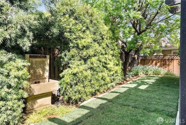 view of yard with fence