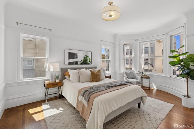 1265 Union St, San Francisco, CA 94109 - bedroom with multiple windows and wood finished floors