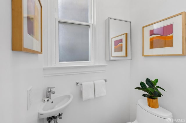 1265 Union St, San Francisco, CA 94109 - half bath featuring a sink and toilet