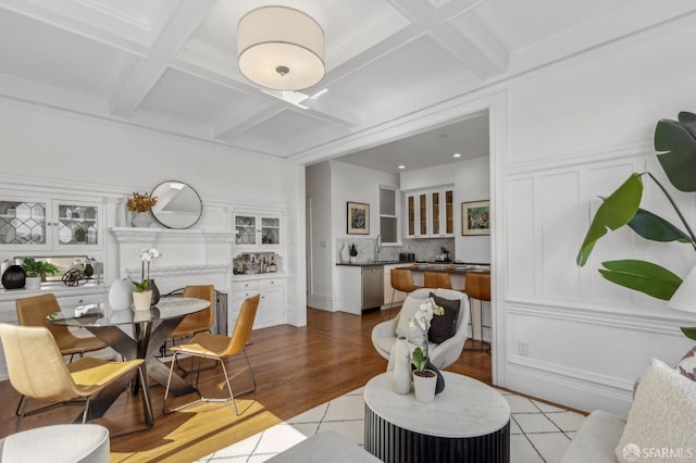 1265 Union St, San Francisco, CA 94109 - tiled living area with coffered ceiling, a sink, and beamed ceiling