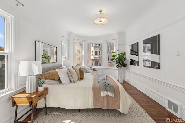 1265 Union St, San Francisco, CA 94109 - bedroom with multiple windows and wood finished floors